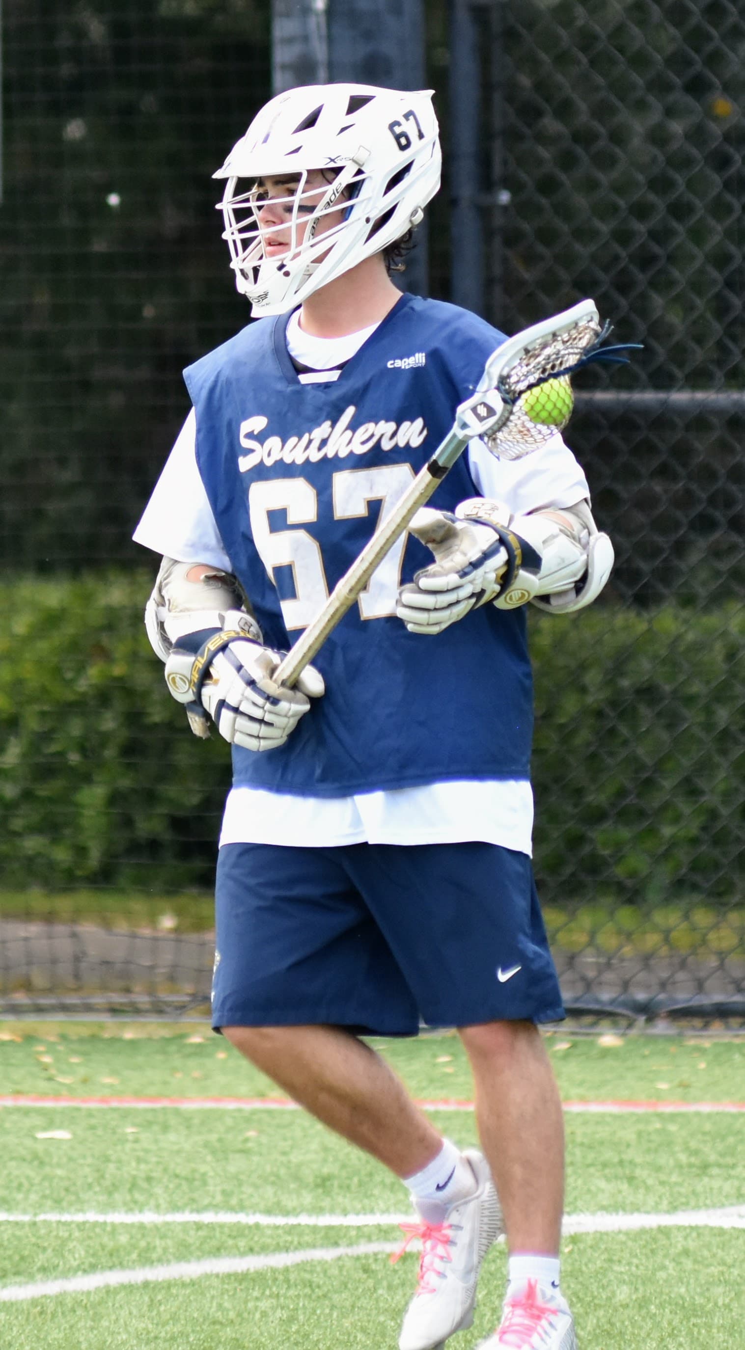 GS #67 with the ball in the navy Southern jersey