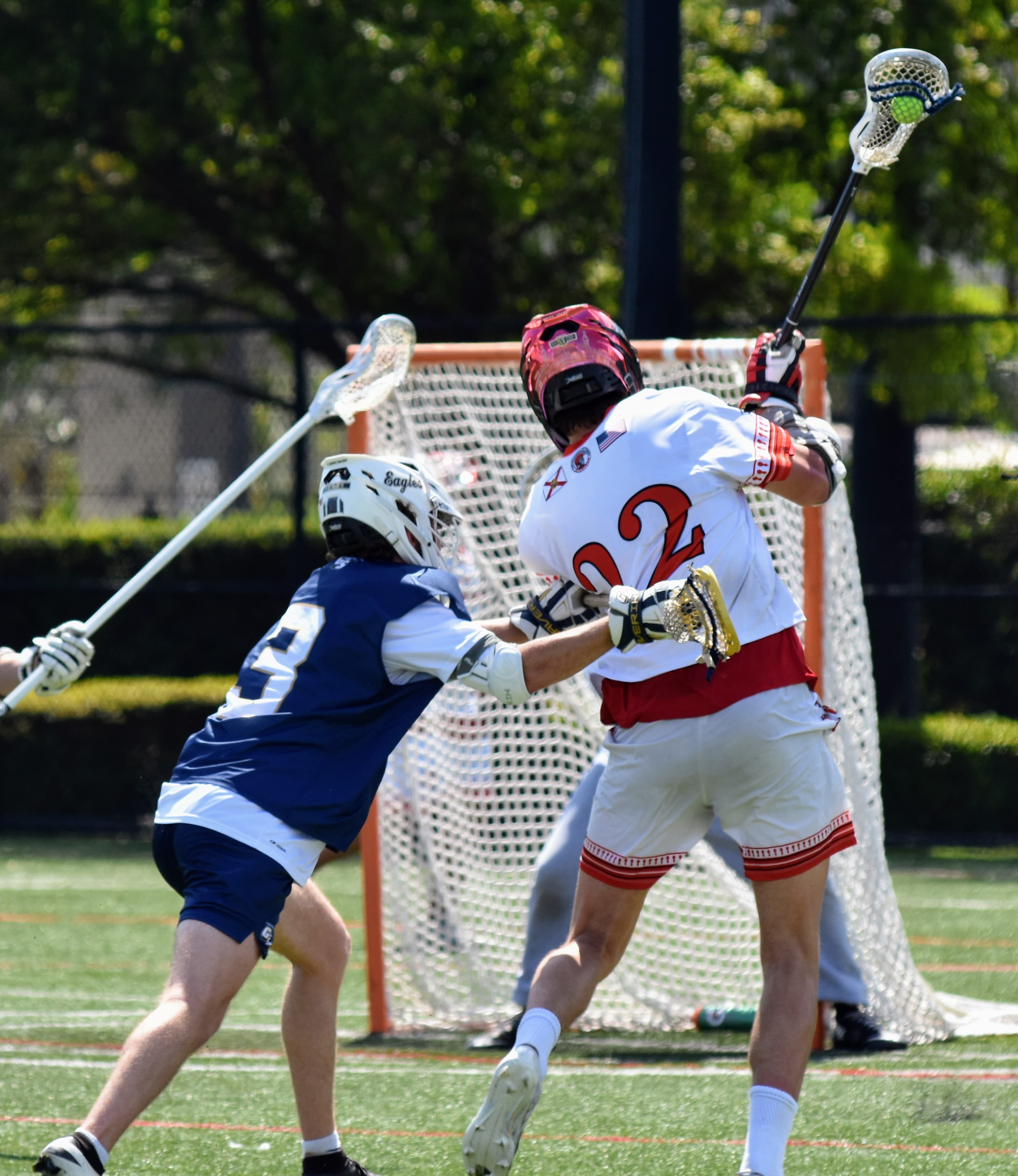 A GS defender guarding the crease against Tampa