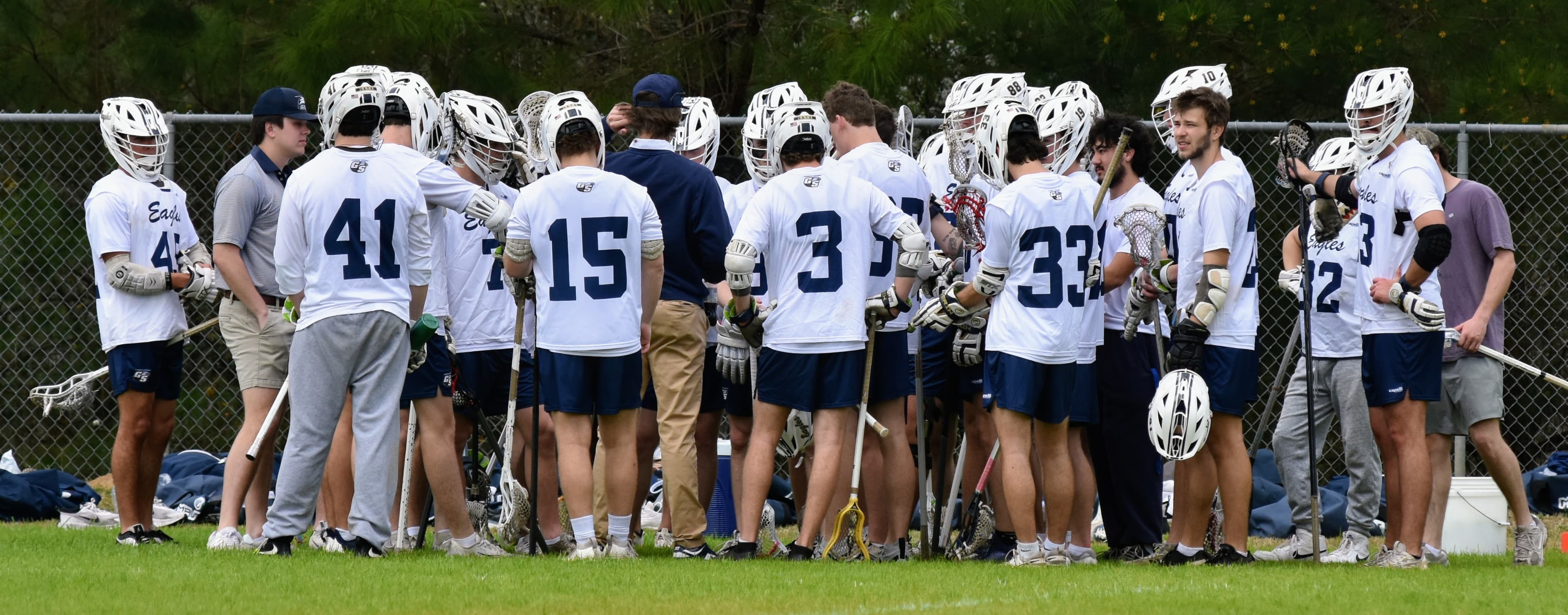 The GS team huddled together before a game